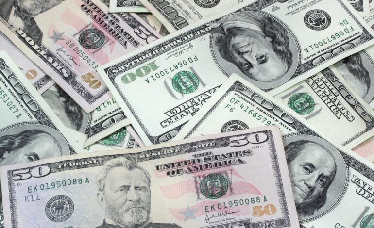 Dollar Gains on Weak Stocks